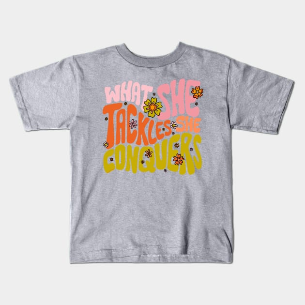 What She Tackles She Conquers Kids T-Shirt by Doodle by Meg